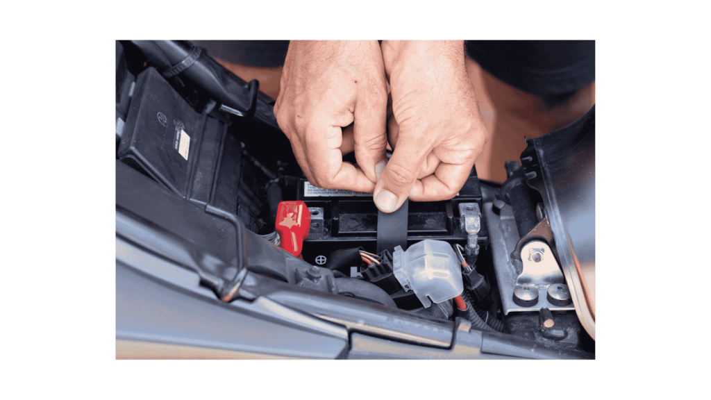 A sleek, silver Mercedes car battery resting on a clean, well-lit surface. The battery is positioned in the center, with its label and terminals visible. The background is slightly blurred, creating a sense of focus on the battery. The lighting is soft and natural, casting subtle shadows that accentuate the battery's form. The scene conveys a sense of care, attention to detail, and the importance of maintaining a healthy Mercedes car battery. kw-battery تبديل بطارية السيارة في المنزل او باب العمل او في الطريق اذا واجهت مشكلة